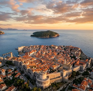 Aerial view of Dubrovnik old town walls and Lokrum Island at sunset over Adriatic Sea