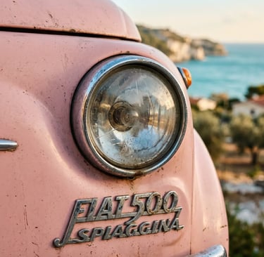 Detailed shot of classic pink Fiat 500 Spiaggina badge and headlight with Puglia coast behind