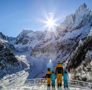 Family enjoying sunny mountain views from a deck near Chamonix Alps.