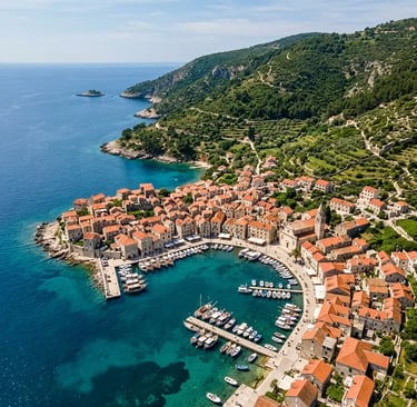 Aerial view of Komiža fishing village and harbor on Vis island Croatia