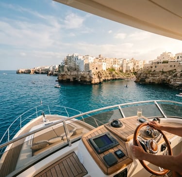 Flybridge perspective with steering wheel overlooking Polignano a Mare cliffs and Adriatic Sea