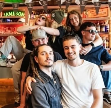 Friends enjoying drinks and socializing at the Funky Fox mountain bar.