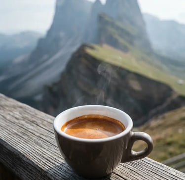 Steaming espresso cup on wooden railing with dramatic Dolomites rock spires behind