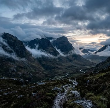 Glencoe Valley at Dawn With Low Clouds Threading Through the Highland Mountain Ridges