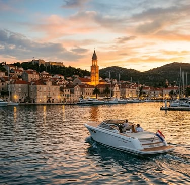 VIP island hopping Split speedboat passing Hvar town at golden hour