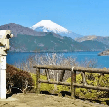 View of Lake Ashi and distant Mount Fuji from an observation deck.