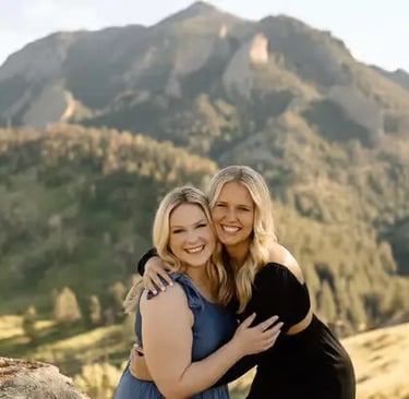 Couple posing during scenic mountain photoshoot in Boulder Colorado with Flatirons backdrop