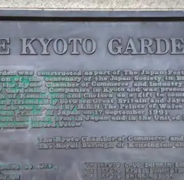 Bronze plaque marking The Kyoto Garden, a gift from Kyoto to the Royal Borough of Kensington