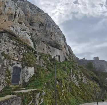 Dramatic limestone cliffs and stone structures at San Giovanni Rotondo, Italy