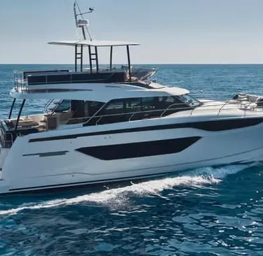 2025 Luxury Powercat Prestige M48 catamaran cruising on calm Mediterranean Sea