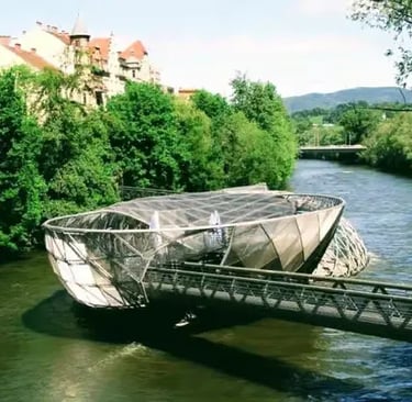 The futuristic Murinsel floating platform on the Mur River in Graz, Austria.