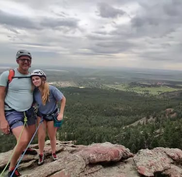 Two climbers navigating steep Flatiron ridge during guided climbing experience Boulder