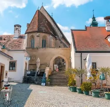 Historic architecture in Innsbruck old town courtyard before starting spring hike Innsbruck outdoor activities in Nordkette