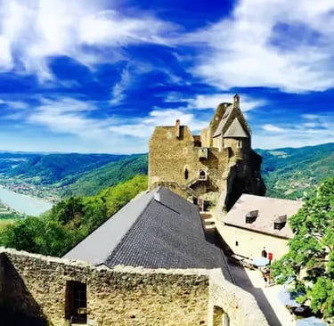 Medieval Dürnstein Castle ruins overlooking the Danube River and Wachau Valley hills