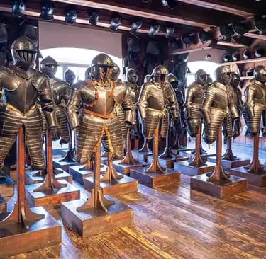Rows of full knight armor suits at the Landeszeughaus museum.
