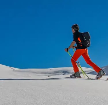 Beginner skier on a sunny slope at Stubai Glacier, Innsbruck.