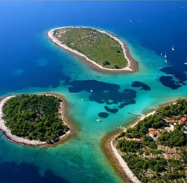 Aerial view of Blue Lagoon turquoise waters and pine islands near Drvenik, Croatia