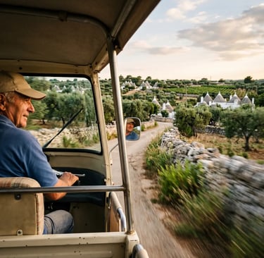 Driver of Ape Calessino moving through trulli countryside in Puglia at sunset