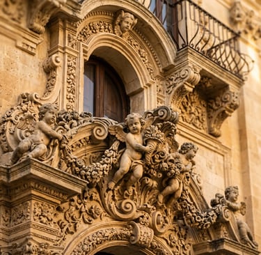 Detailed baroque cherub sculptures on golden limestone facade in Lecce, Southern Italy