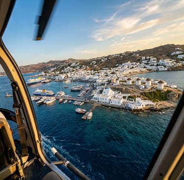 Aerial view of Mykonos harbor and windmills seen from helicopter window on arrival