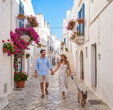 Happy couple holding hands with terrier dog in Ostuni white alley with bougainvillea, Puglia