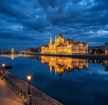Illuminated Budapest Parliament reflected in calm Danube River at night