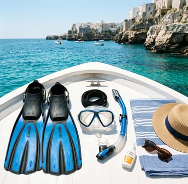 Snorkeling fins mask and gear on white boat deck with Puglia cliffs in background