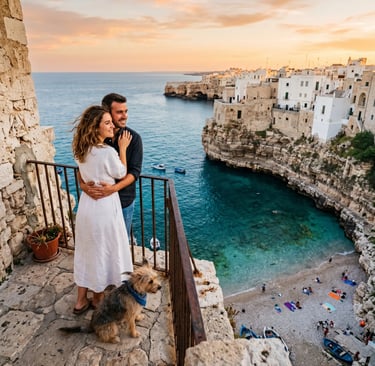  Couple with dog hugging on Polignano cliff over turquoise cove at sunset, Puglia coast