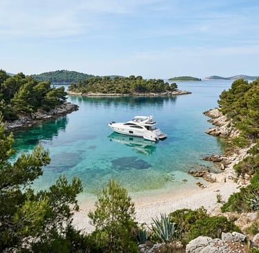 Luxury yacht anchored in a secluded Pakleni Islands cove with clear turquoise water