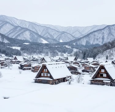 Magical winter illumination of snow-covered Shirakawa-go houses.