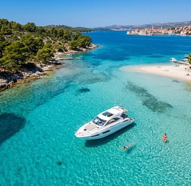 Speedboat anchored in the Blue Lagoon near Trogir with swimmers in shallow turquoise water