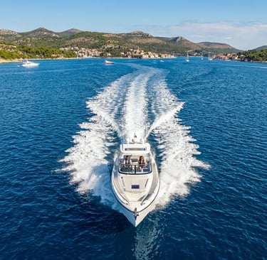 Private speedboat cutting through blue Adriatic Sea near Croatian islands