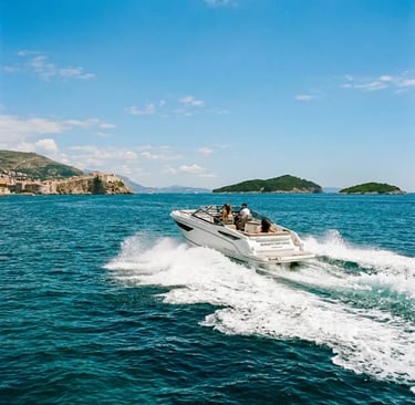 Private speedboat cruising past Dubrovnik old town toward the Elaphiti Islands