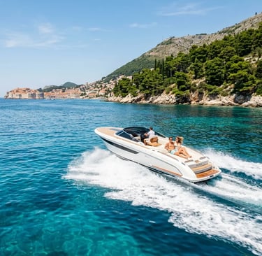 Private speedboat gliding on turquoise water past Dubrovnik Old Town