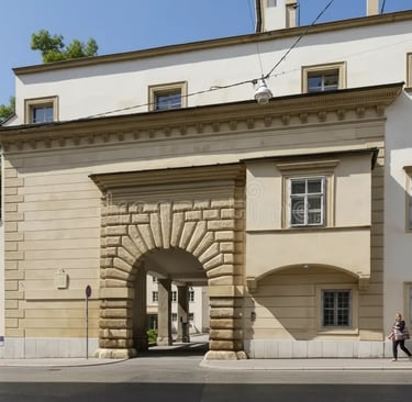 Historic stone gatehouse archway in Graz Austria on a sunny summer day