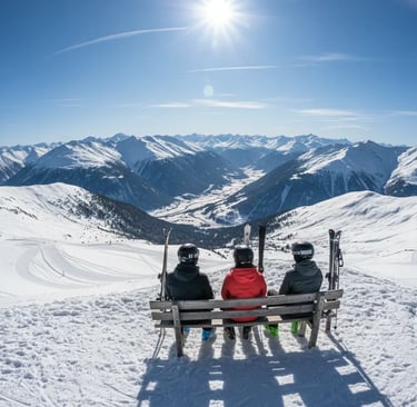 Three skiers sitting on a wooden bench at the mountain top, overlooking a sunny snow-covered valley 