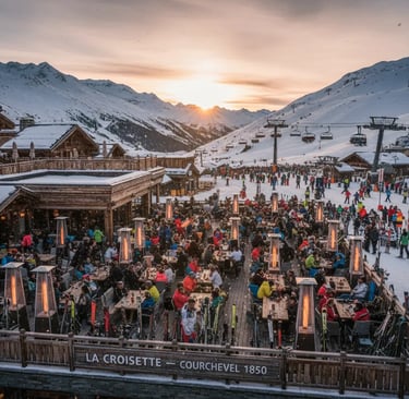 La Croisette Courchevel 1850 outdoor dining area during winter sunset.