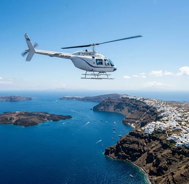 Bell 206 helicopter flying over Santorini volcanic caldera and turquoise Aegean Sea