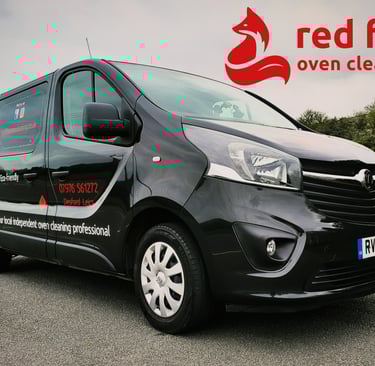 The Red Fox Oven Cleaning van is a black Vauxhall Vivaro fully fitted out with specialist equipment