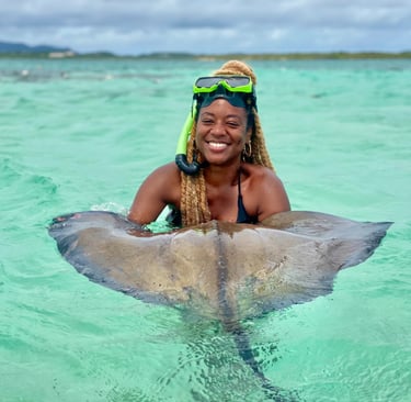 Melissa Rose Cooper snorkling in the caribbean.