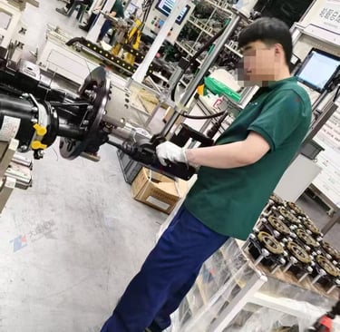 Dalian Kangzhan right-angle torque pistol nutrunner operating on e-drive axle assembly line