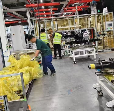 Dalian Kangzhan right-angle torque gun operating on e-drive axle assembly line