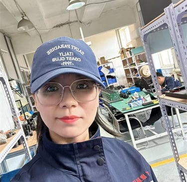 Worker operating right-angle nut runner in Chinese factory