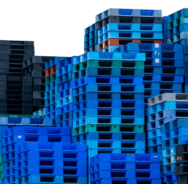 a bunch of plastic pallets crates of blue crates with a clock on them