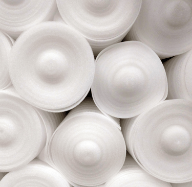 a bunch of white foam rolls