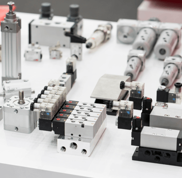 a table with a bunch of different types of valves