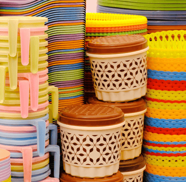 a bunch of different colored plastic containers