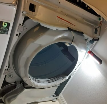 a dryer with front panel off