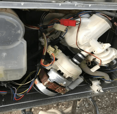 a pictures shows the internal component of a dishwasher