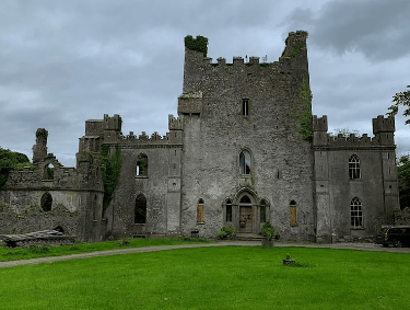 a castle like structure with a large stone building